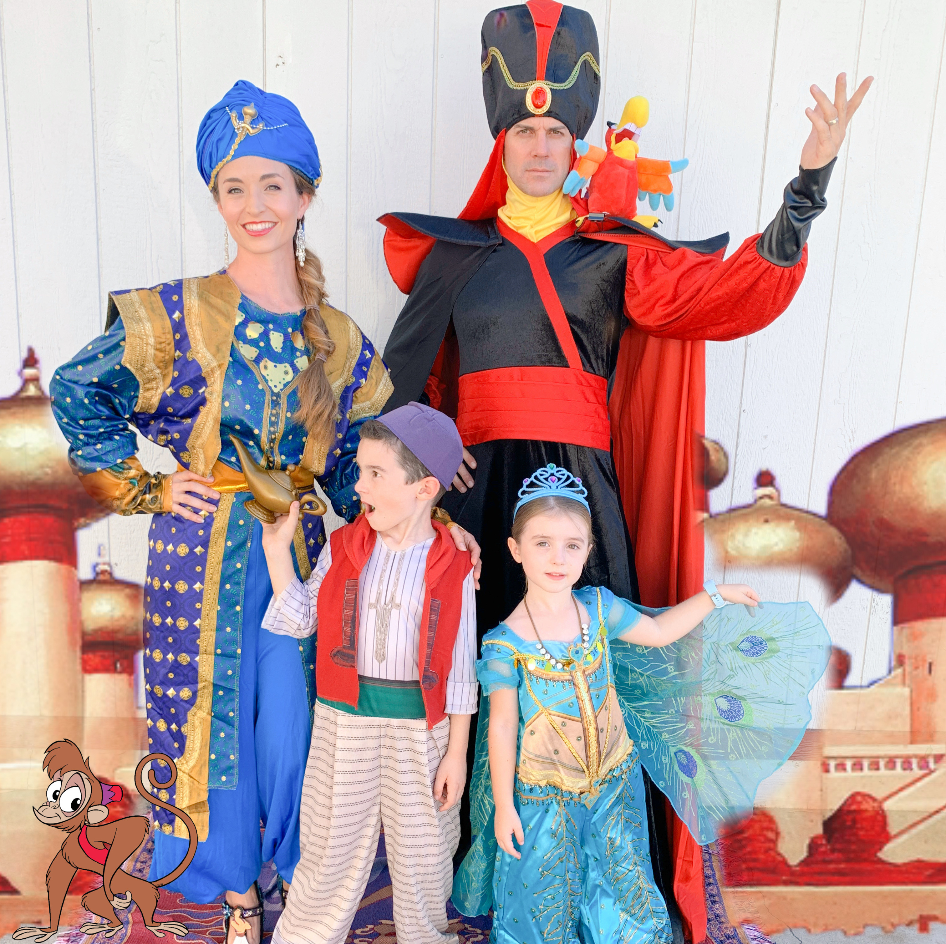 Close-up of a family member in a Genie Disney Halloween costume with blue face paint and a playful expression.