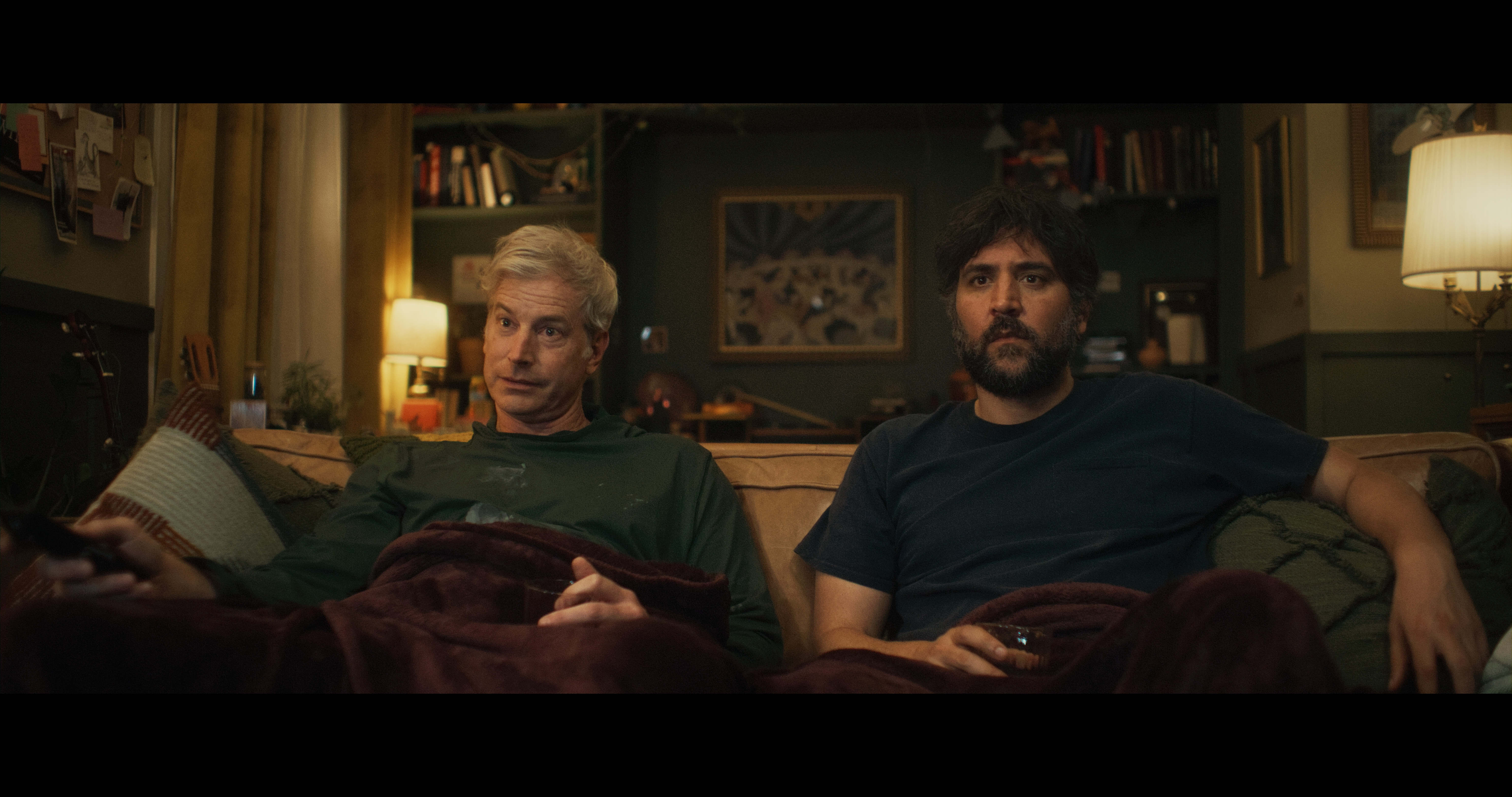 Rob Huebel and Josh Radnor in &quot;All Happy Families&quot; movie, depicting the brotherly dynamic at the heart of the family movie cast.