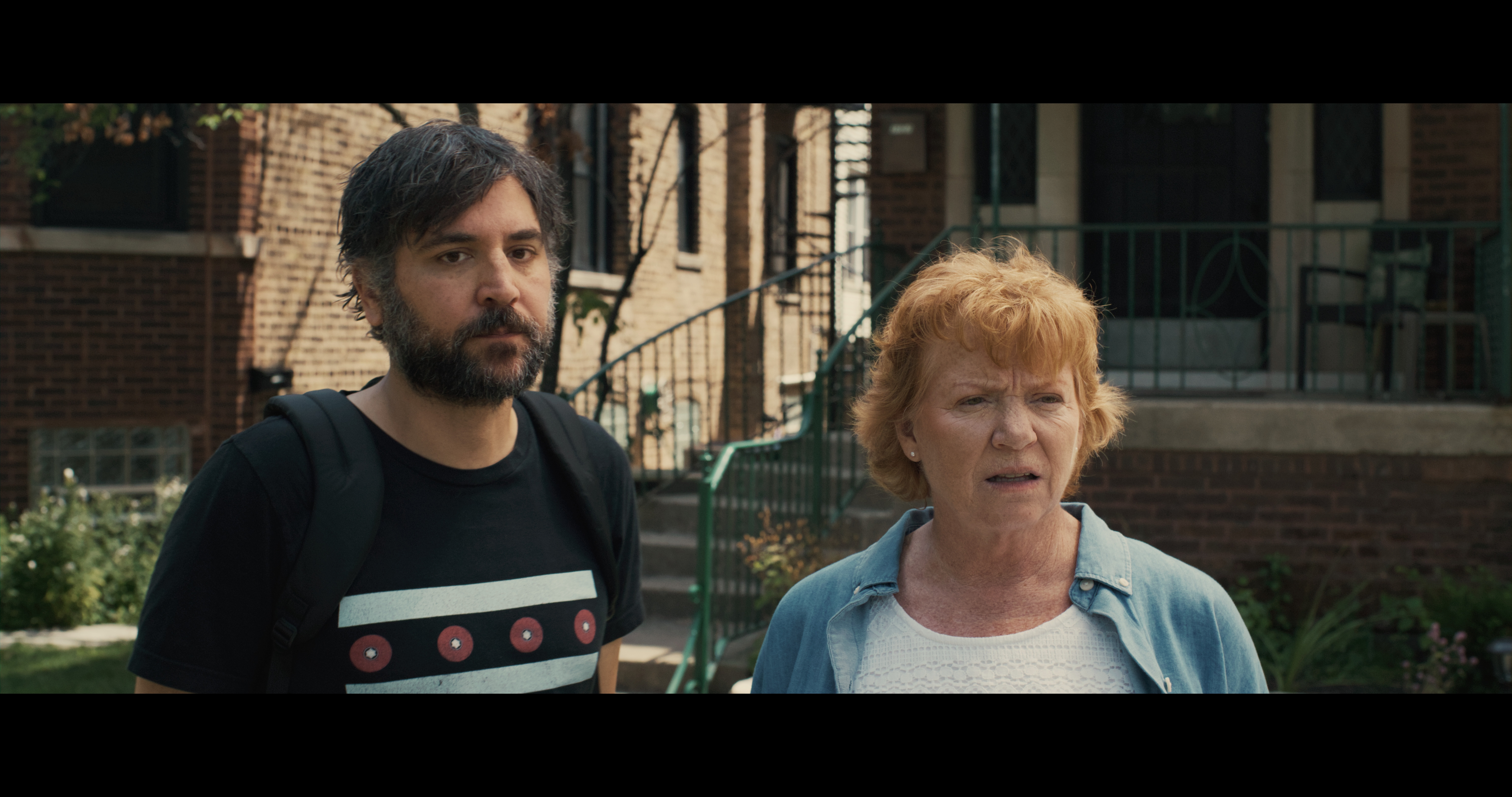 Josh Radnor and Becky Ann Baker in &quot;All Happy Families&quot;, a scene highlighting the mother-son dynamic within the family movie cast.