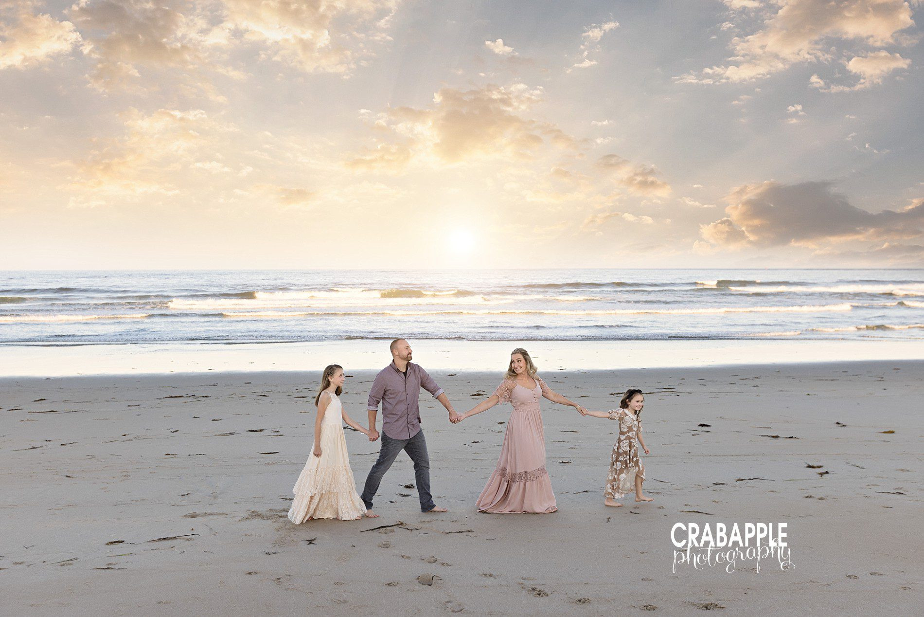 Walking family photos outdoors in fall setting