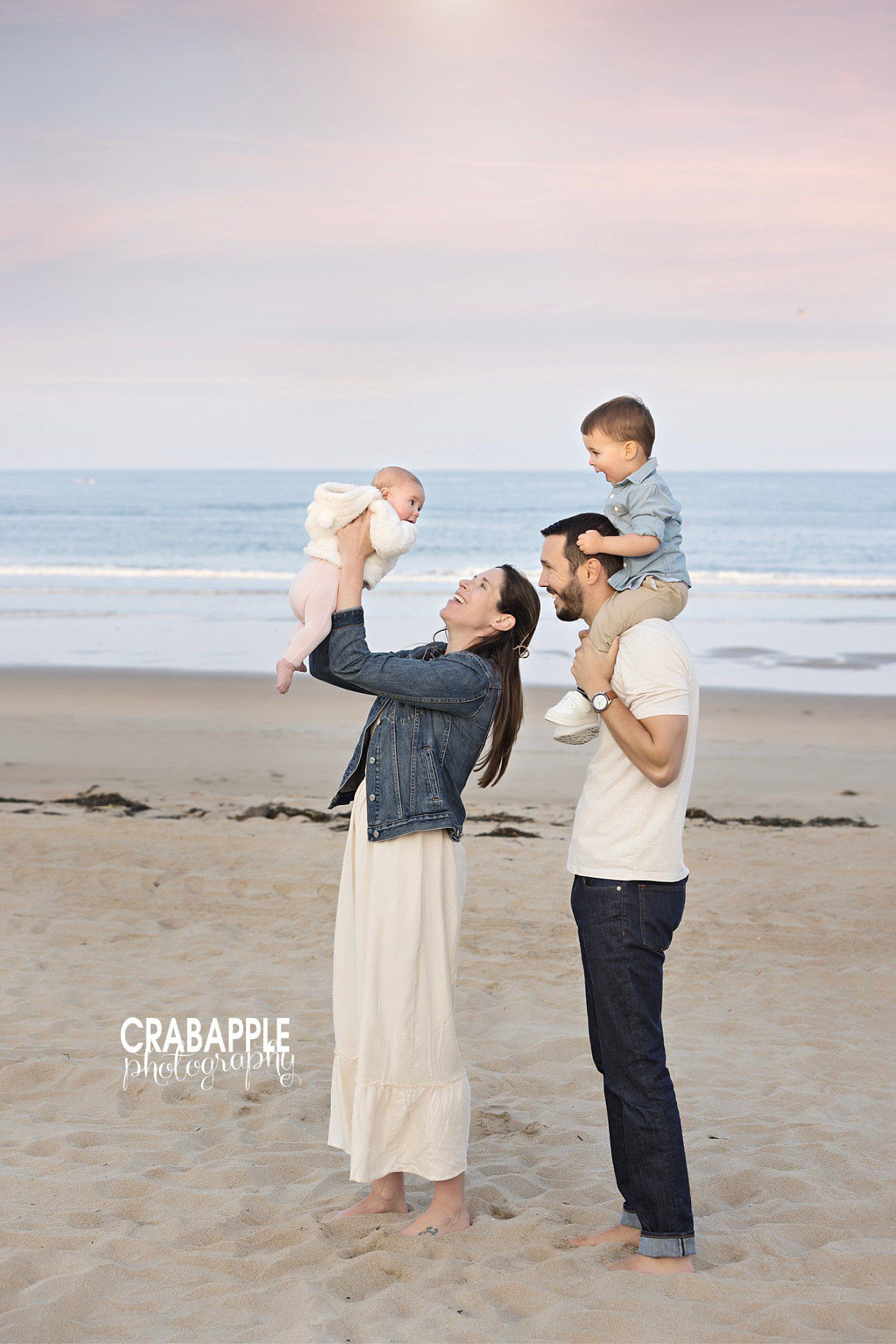 Outdoor fall family photos with playful interactions