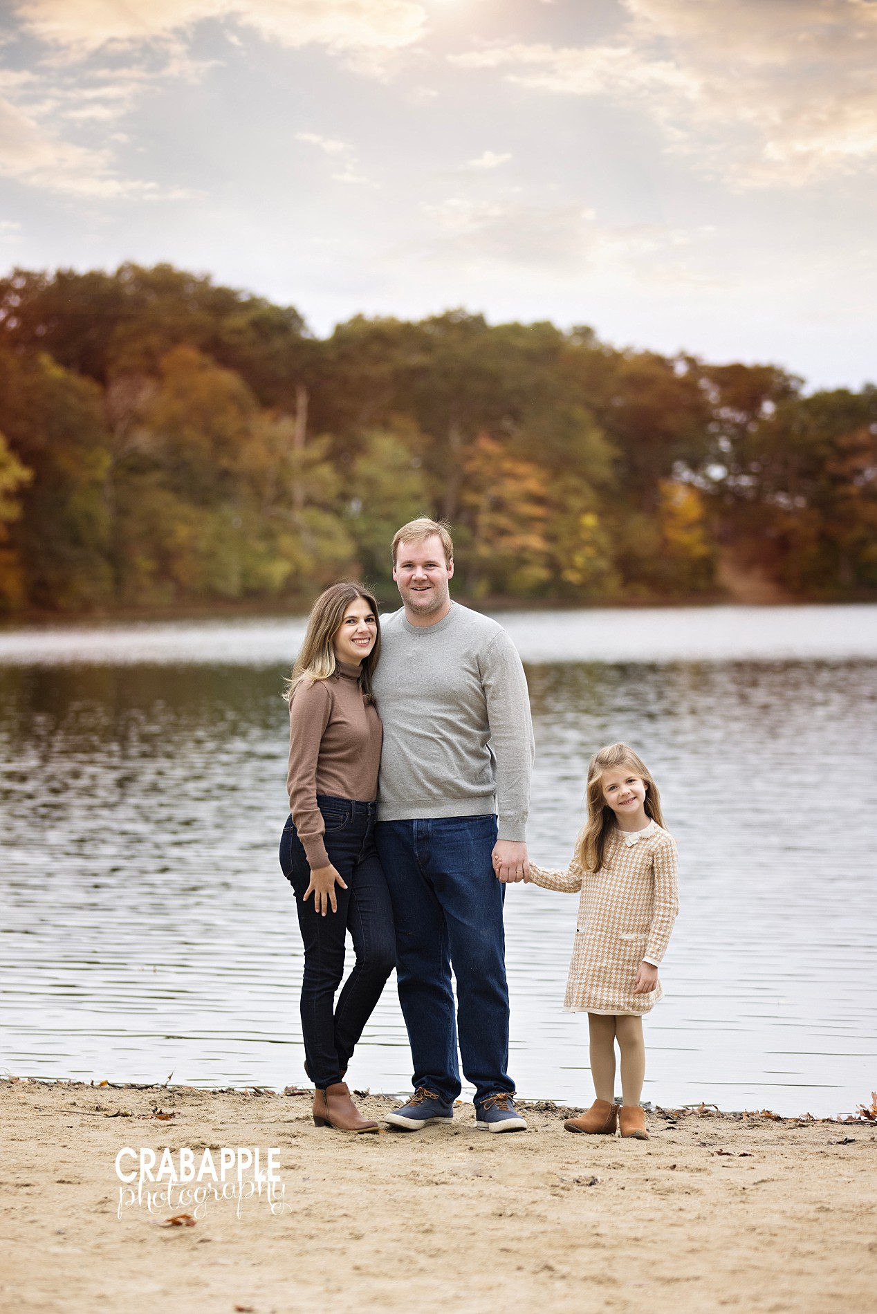 Waterfront fall family pictures with golden light