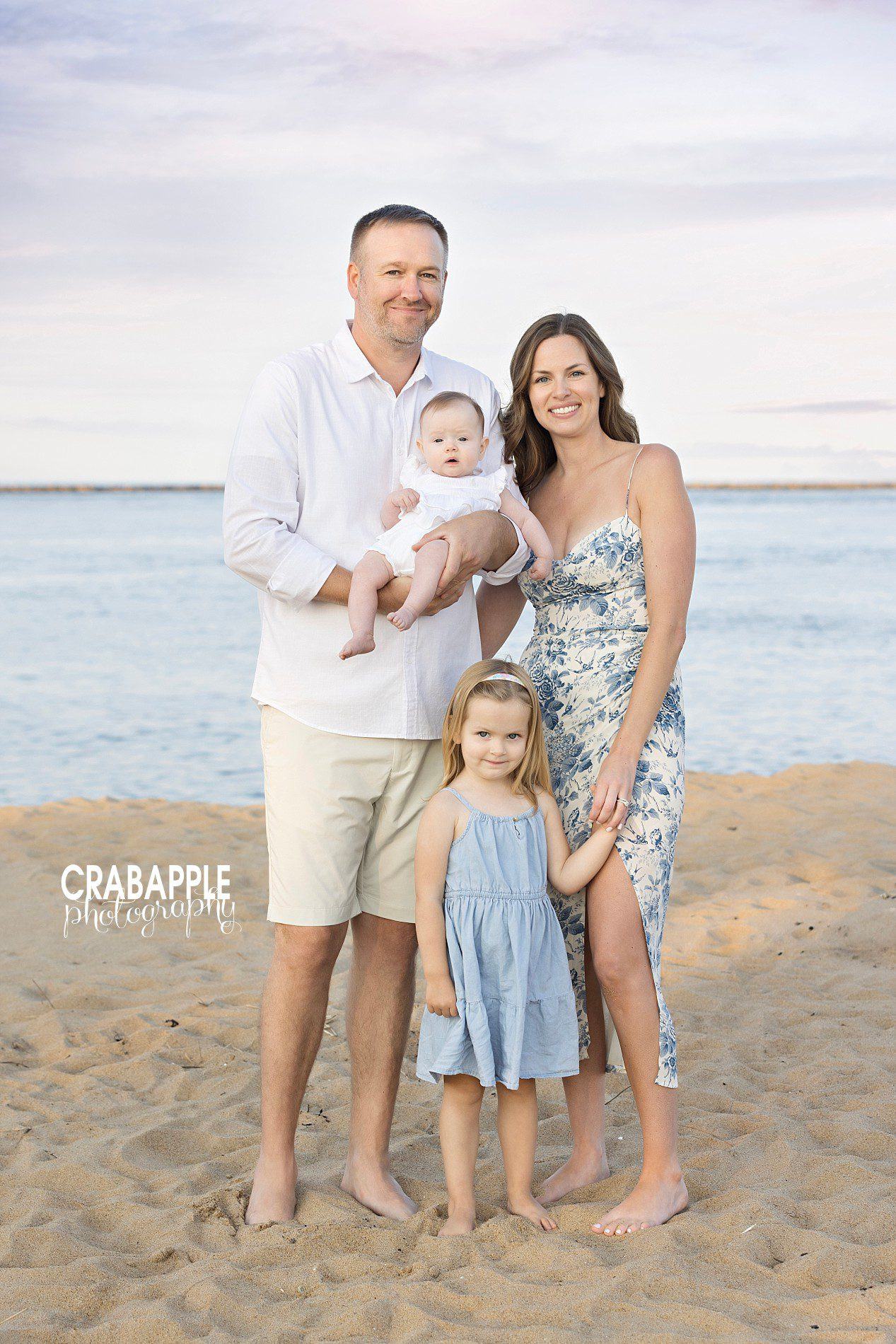 Fall beach family photos with warm sunset tones