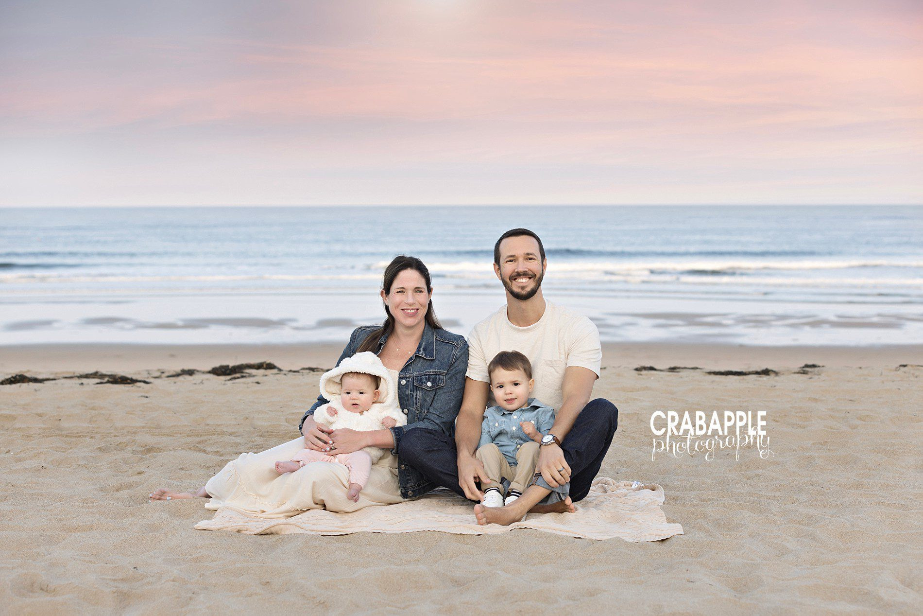 Family photos with baby and toddler in fall setting