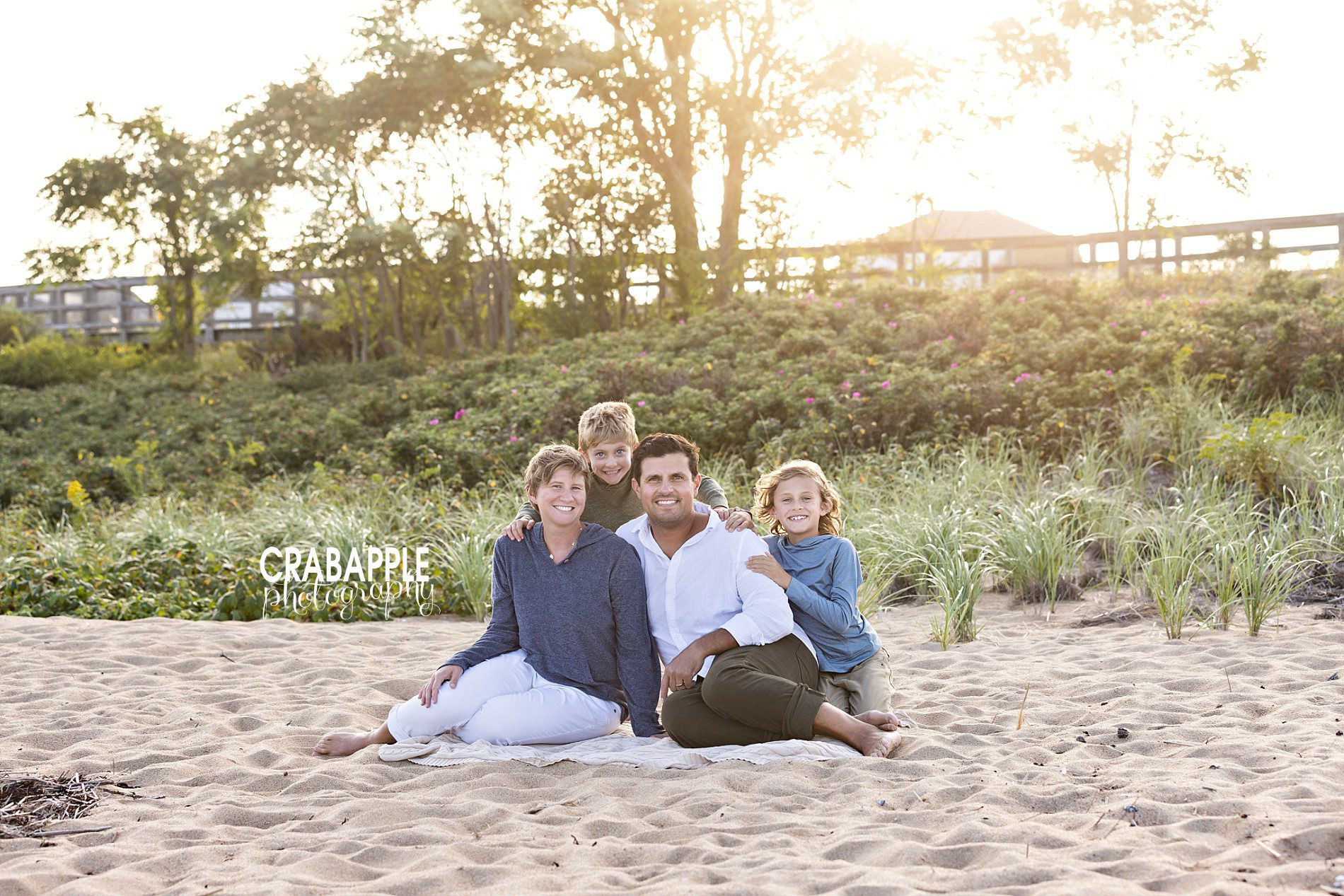 Gorgeous fall family photos outdoors in a sitting pose