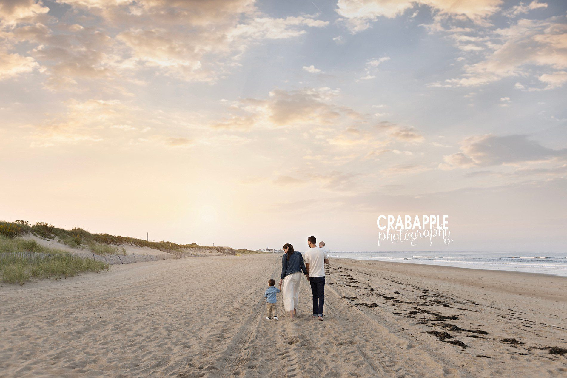 Outdoor fall family photos with natural walking pose