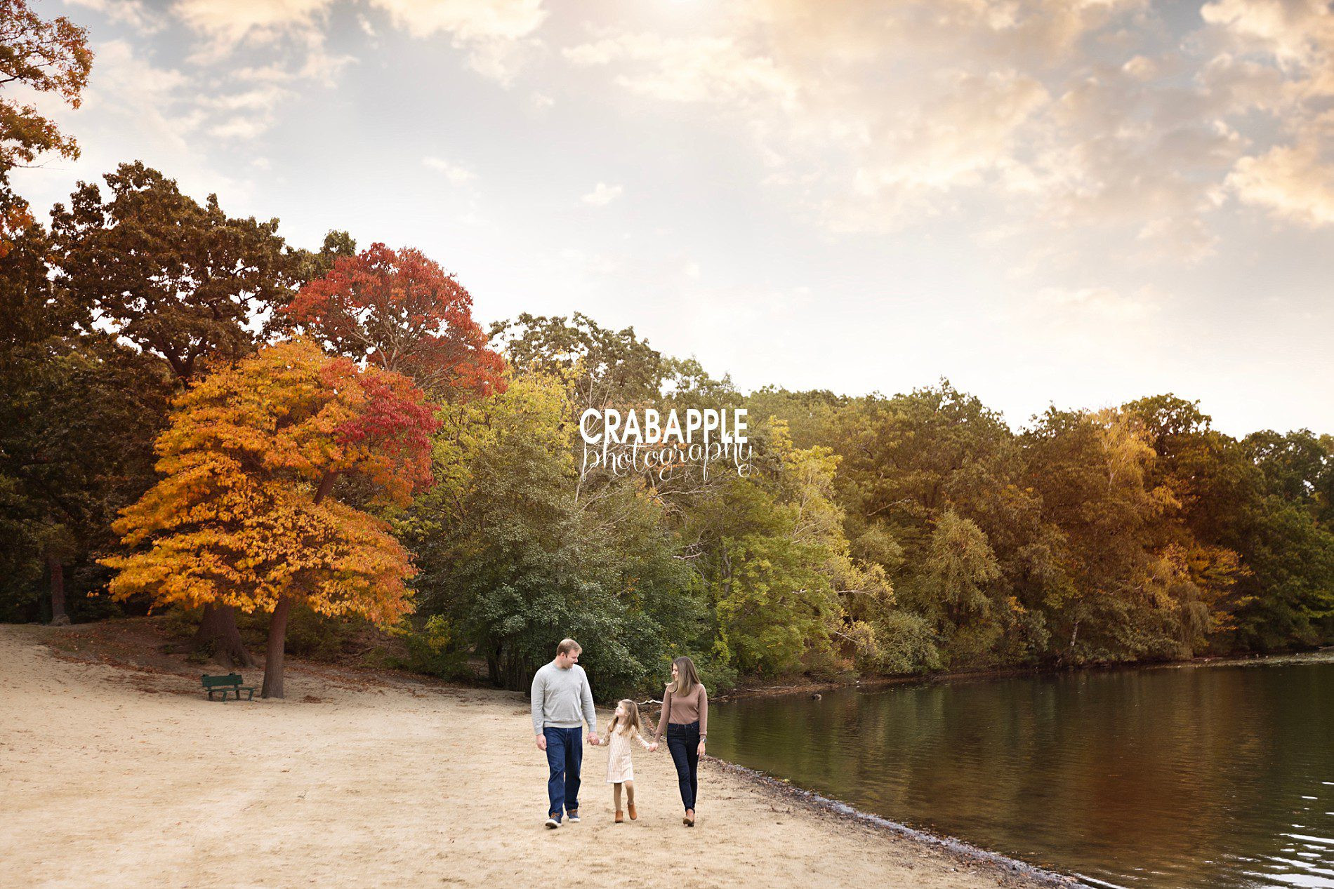 Fall family photos in motion walking through leaves
