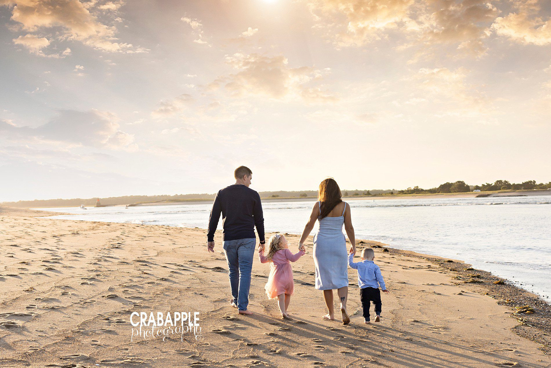 Fall beach family photos with walking pose