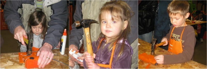 Kids enjoying a Home Depot workshop, building and painting wooden projects