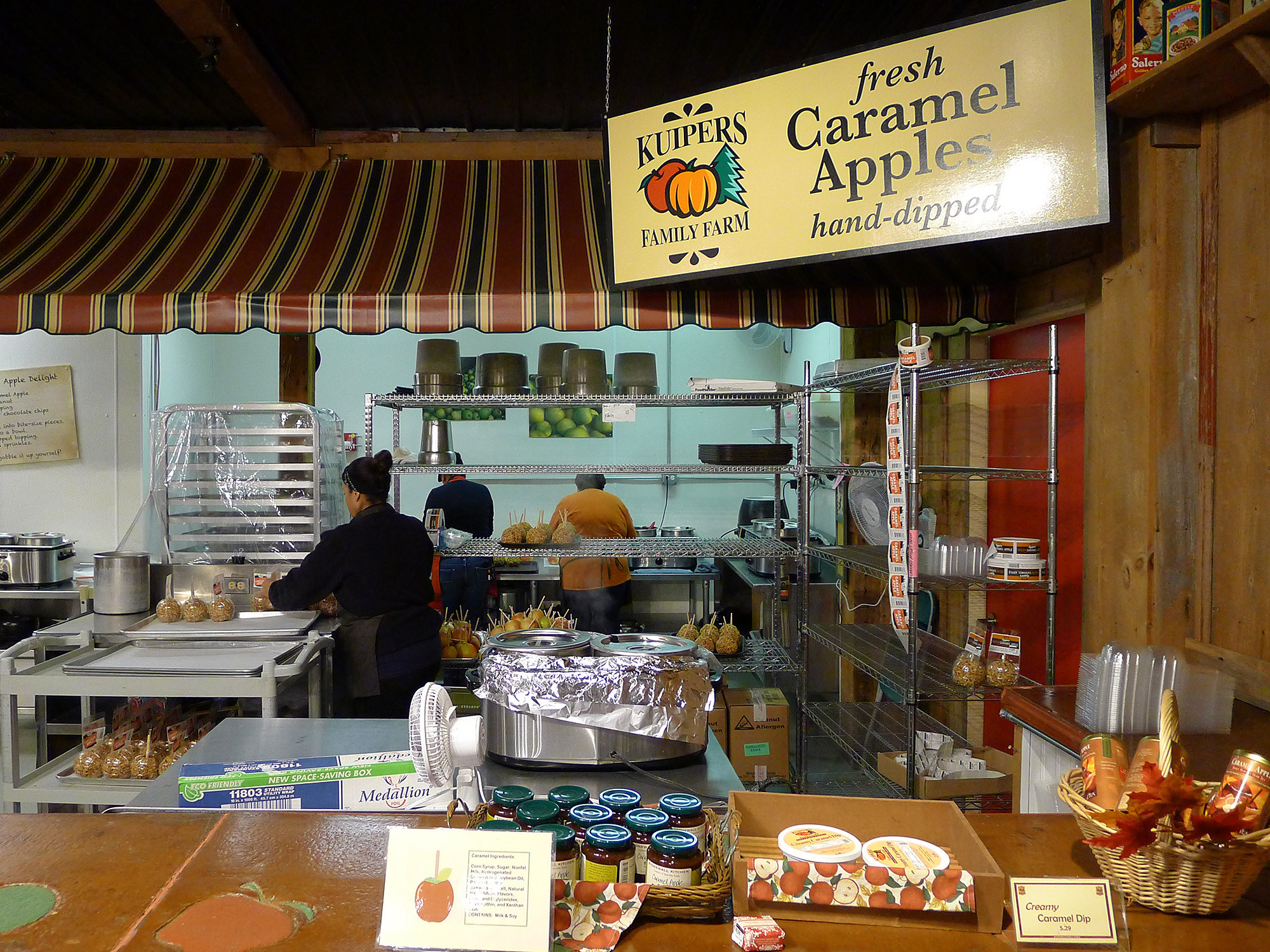 Bakery at Kuipers Family Farm Showcasing Hand-Dipped Apples, Doughnuts, and Cider