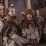 Viking family in their house