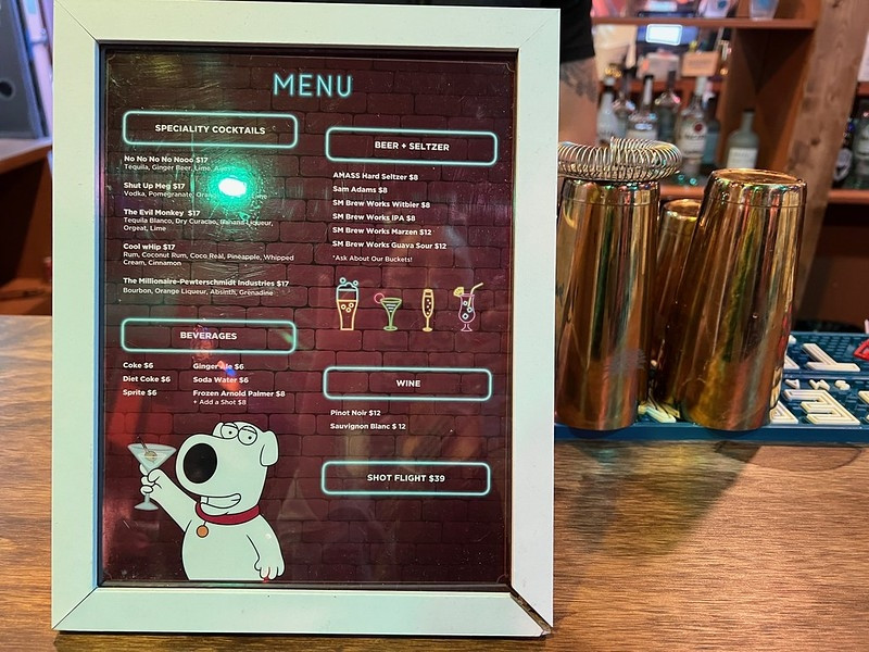 Themed drink menu at The Drunken Clam bar at Family Guy Giggity Golf