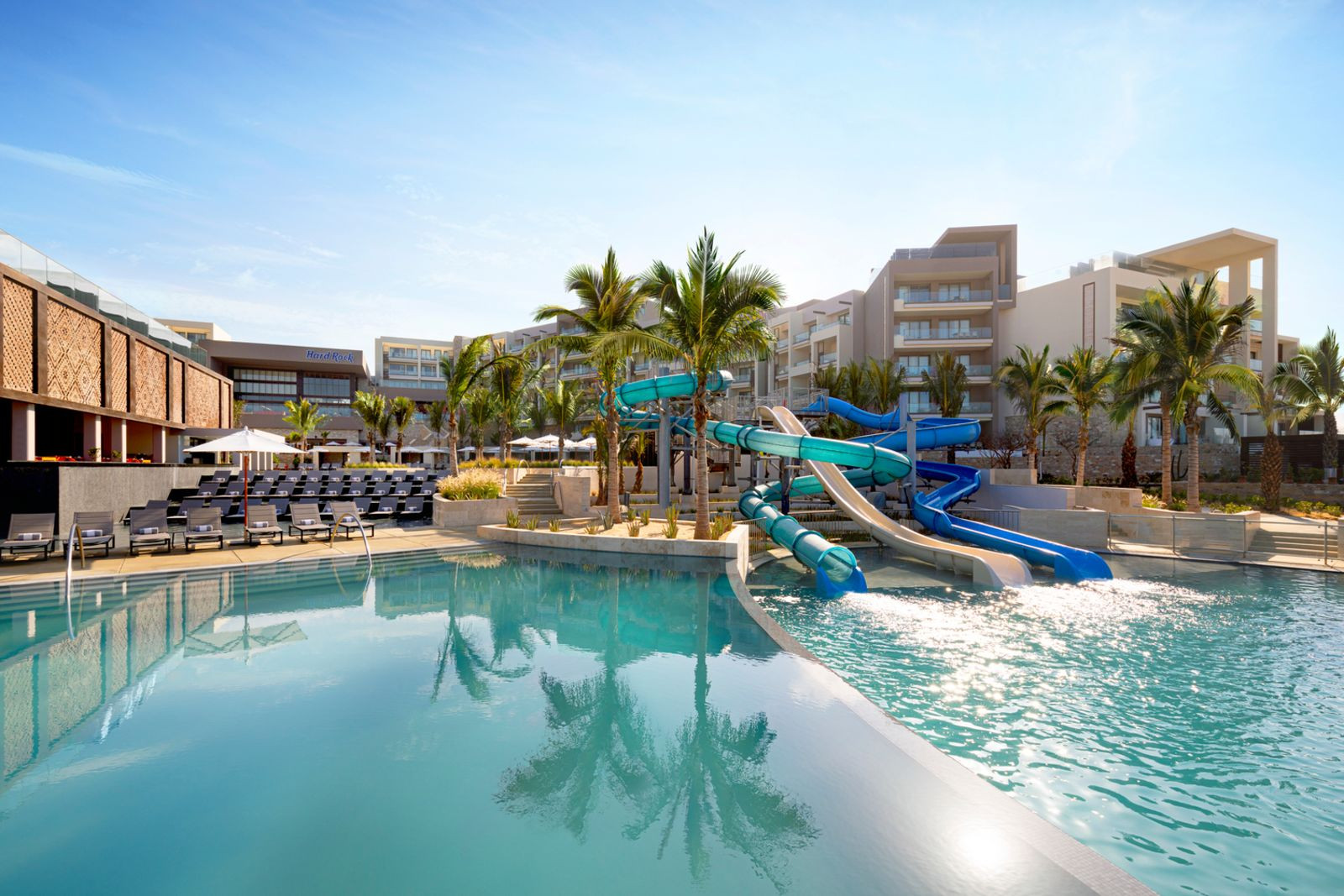 Hard Rock Hotel Los Cabos featuring a vibrant pool area with music and family activities, a top choice for all inclusive family resorts in Cabo San Lucas