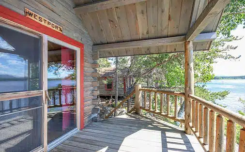 Private balcony overlooking the lake at a cottage at Attean Lake Lodge, Maine