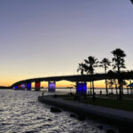 Ringling Bridge in Sarasota, Florida, showcasing a scenic view of the city and bay, symbolizing a desirable family-friendly location with cultural attractions and waterfront living