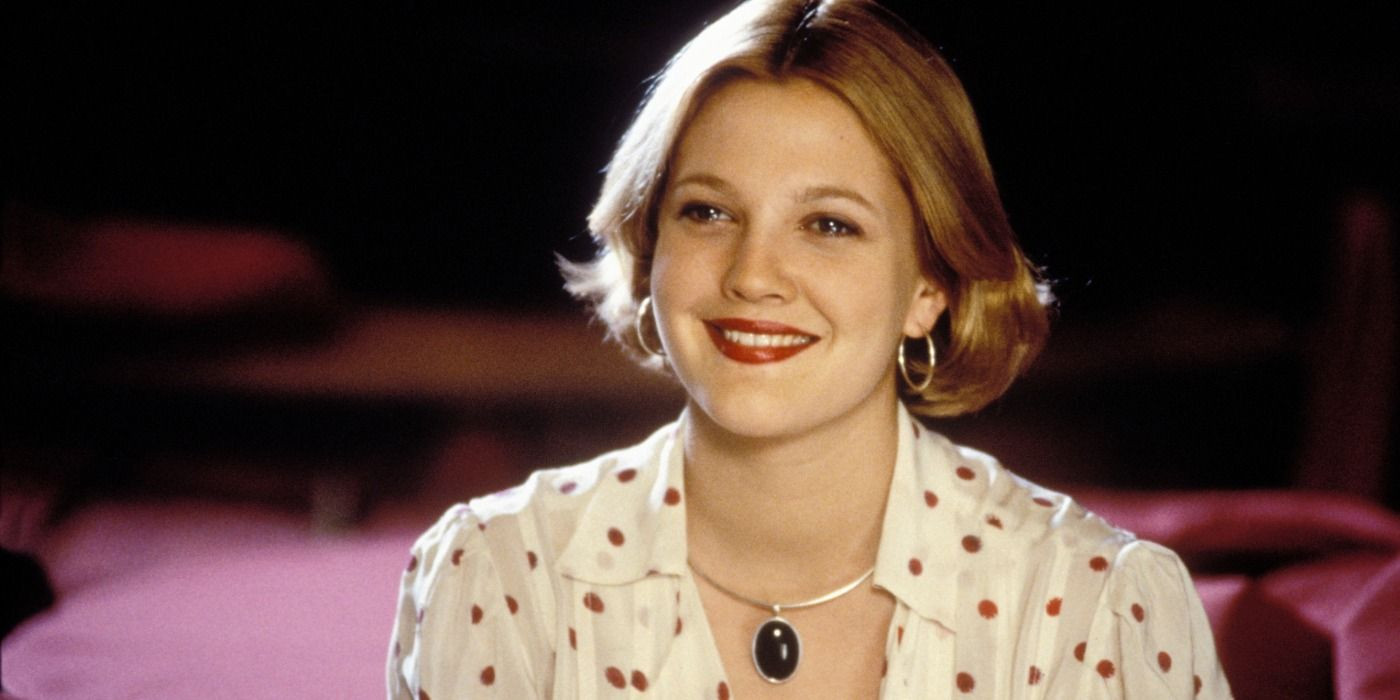 Drew Barrymore smiling in The Wedding Singer.