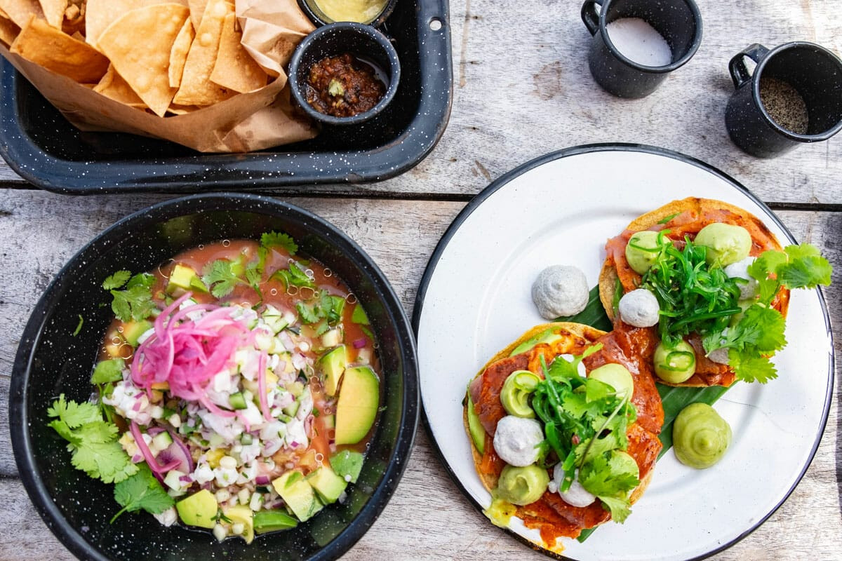 Fish ceviche at Papaya Playa Project, highlighting the fresh seafood options available at this Tulum beach club restaurant.
