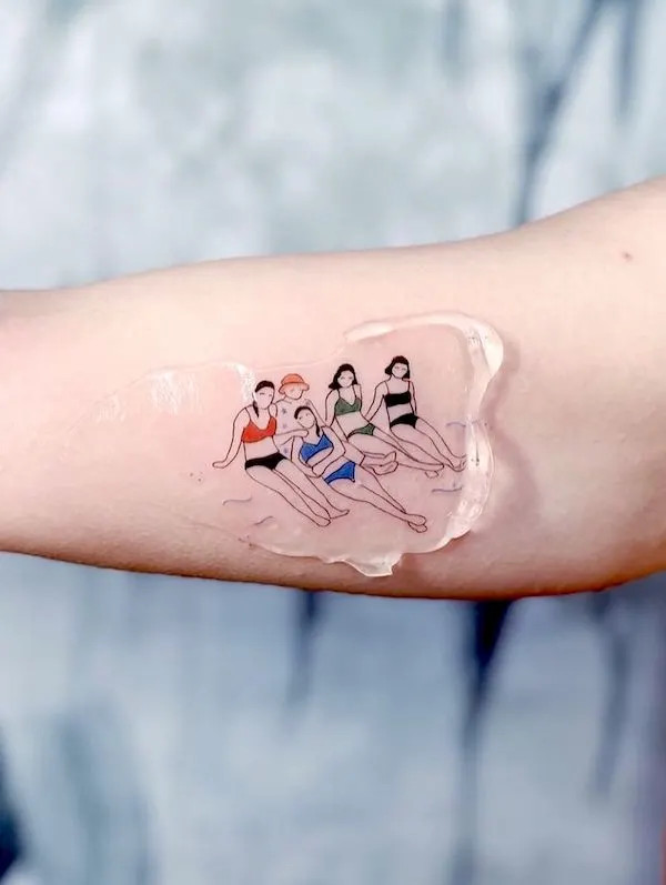 Family vacation bicep tattoo by @berivanis.tatts