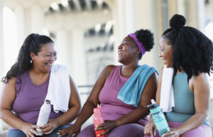 Multiracial group of women taking a break after exercise at Marion Family YMCA