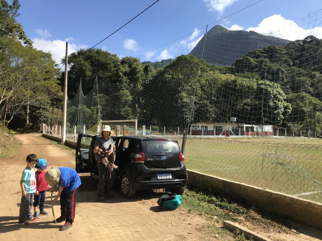 Family on a self-guided car tour in rural Brazil