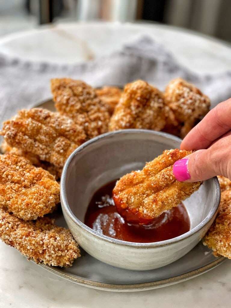 Another angle of homemade chicken nuggets, emphasizing their healthy baked preparation and appealing presentation.