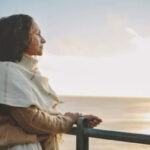 Woman looking into distance, representing thoughtful legal counsel