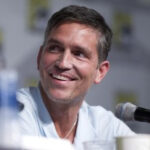 Jim Caviezel at Person of Interest panel, alt text: Jim Caviezel at Person of Interest panel, reflecting on family and faith