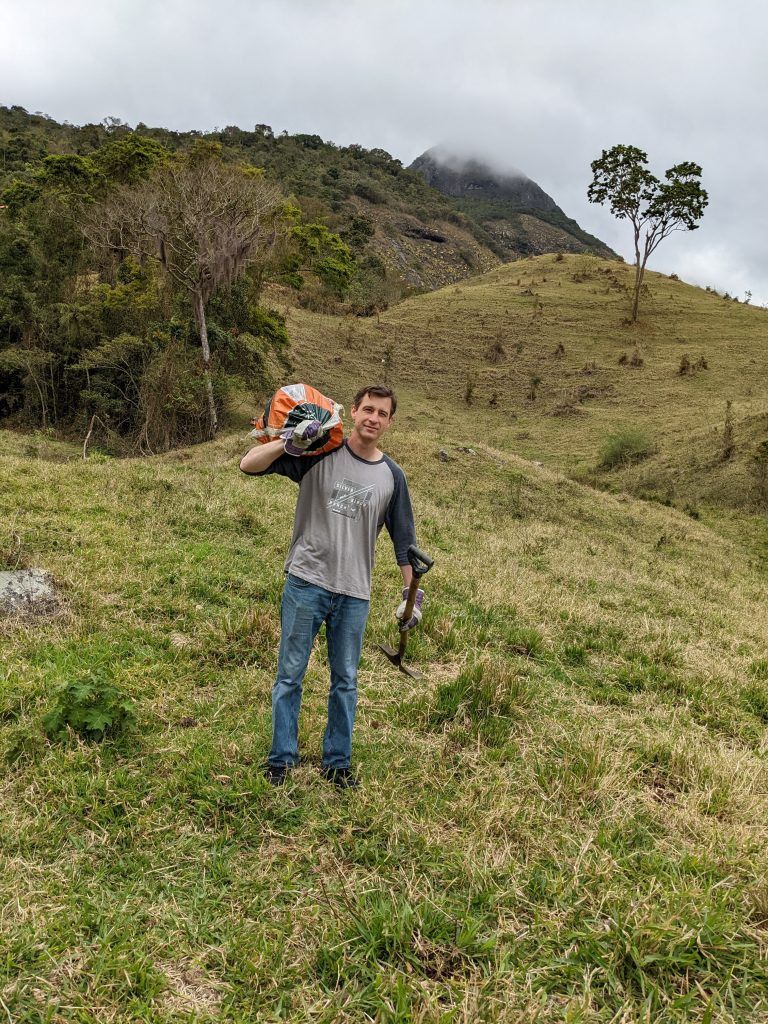 Collecting cow poop at Eco Caminhos, Brazil