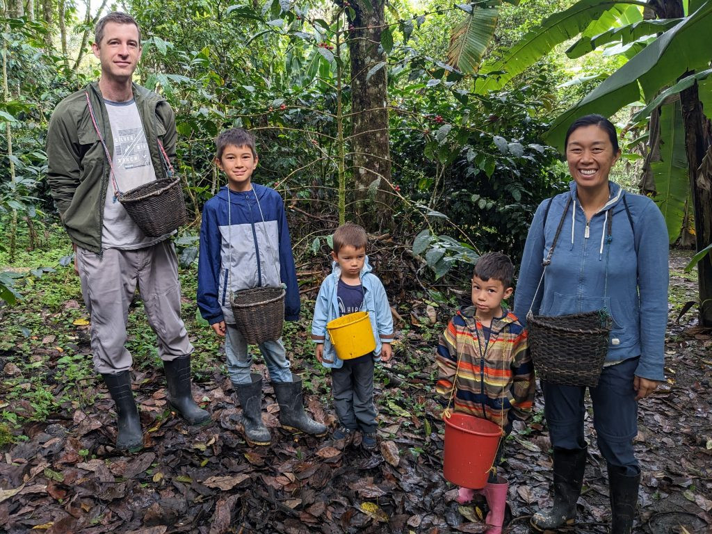 Family working together at a volunteer farm