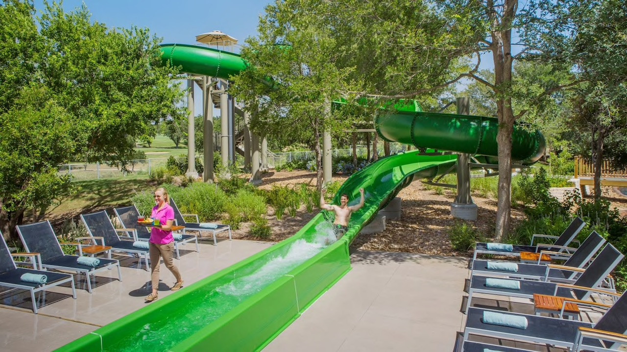 Hyatt Regency Hill Country Resort water slides, Texas resort water slides for families, best water slides Texas resorts, family-friendly resort water parks, San Antonio water park hotels, Hyatt Regency water park features, Texas family vacation water parks, resort water activities Texas, summer fun for kids Texas, Hill Country family resorts with water parks,