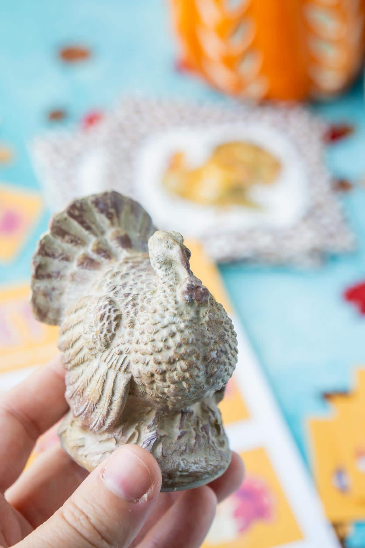 Ceramic turkey being held in a woman