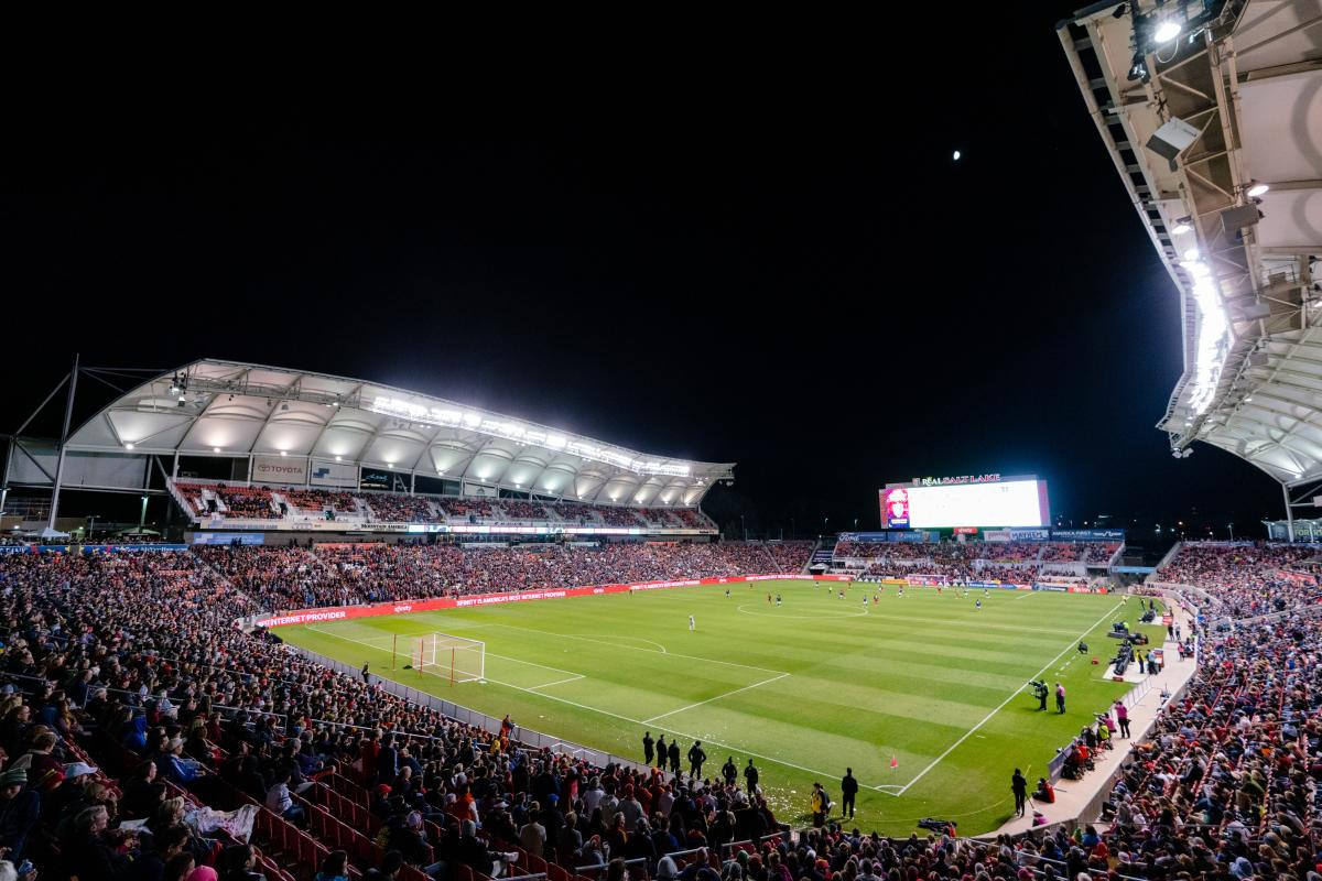 Fans cheering at a REAL Salt Lake soccer game in Rio Tinto Stadium