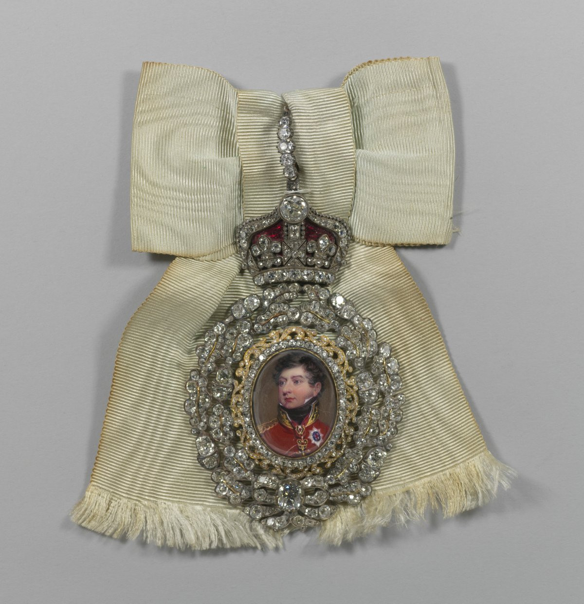 Royal Family Order of King George IV, showcasing the jeweled portrait and ivory ribbon