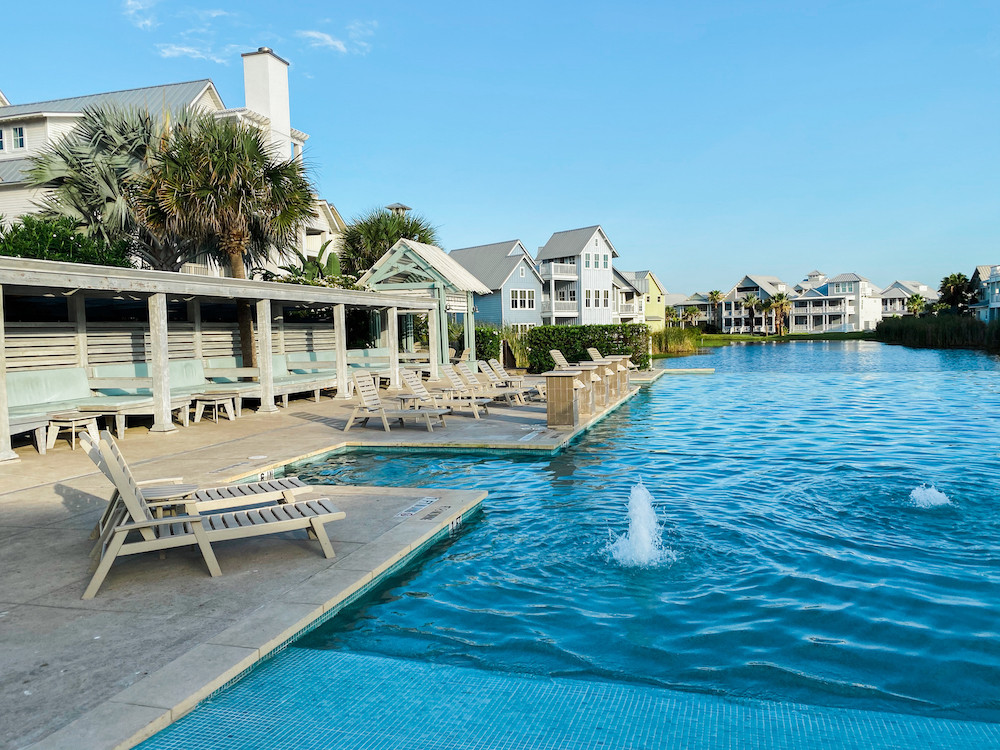 The pristine beach at Cinnamon Shore in Port Aransas provides an idyllic setting for families to enjoy beach activities and relaxation