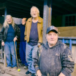 The Whittakers outside their home