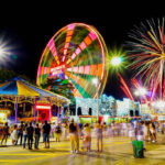 Crowd watches Fireworks over Coney Island, Brooklyn New York, USA