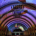 The 3D light show at St. Louis Union Station showcases animals from the St. Louis Aquarium, creating a captivating experience for families, especially children, combining entertainment and education.